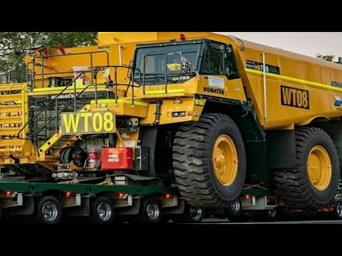 Hard Transporting Up Mountain Caterpillar 245B Excavator With Goldhofer Trailer.