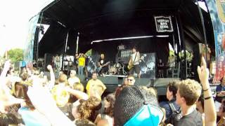 Less Than Jake gives a lucky fan a Mohawk at Warped Tour 2011