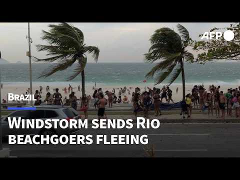Video Thumbnail: Beachgoers flee high winds in Rio de Janeiro | AFP