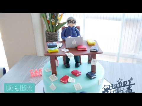 Tarta - Hombre esculpido en fondant con laptop y libros