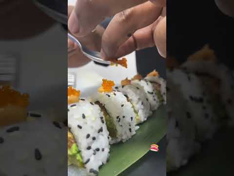 Topping sushi with japanese orange tobiko