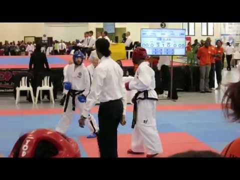Mens Sparring Microweight Finals - Canada vs Jamaica - 2014 ITF World Cup Jamaica