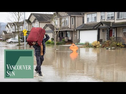 Residents Access Flood Damage in Abbotsford Neighbourhood