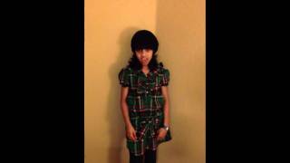 Ali singing "Rolling in the deep" by Adele