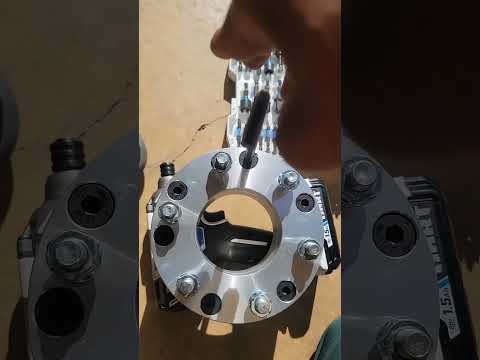 Installing 2-inch spacers/ 5 lug to 6 lug adaptors for my 22" monster rims! #trending #shorts #f150