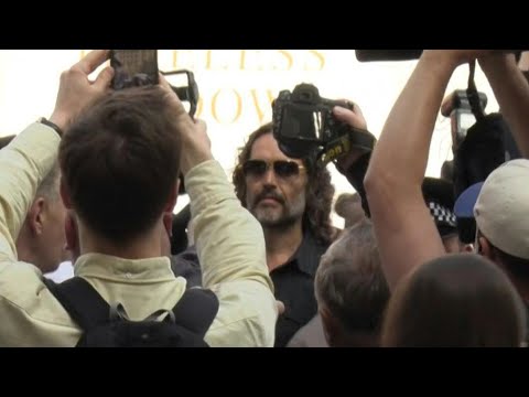 British comedian Russell Brand arrives at court to face rape charges | AFP