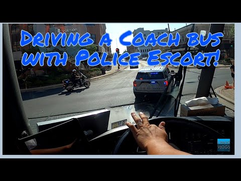 Driving a coach bus with police escort