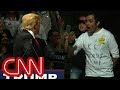 Trump stares down man in 'KKK' shirt