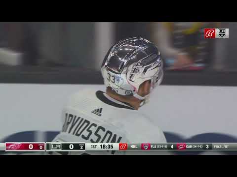 Drew Doughty drops Lucas Raymond with a hit in the neutral zone.