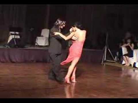  Javier Rodriguez  and  Geraldine Rojas  are  dancing  to  the  tango  "  Mareados  "