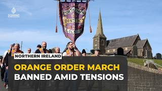 Northern Ireland bans Orange Order march after two-week standoff raises sectarian tensions
