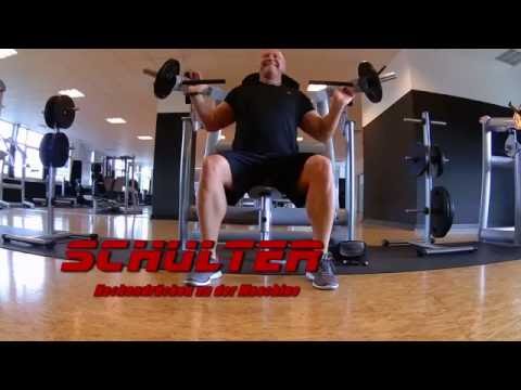 Fitness und Bodybuilding: Schulter Nackendrücken an der Maschine