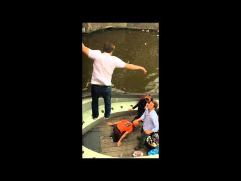 Breaking a boat on King's Day in Amsterdam (26/04/2014)