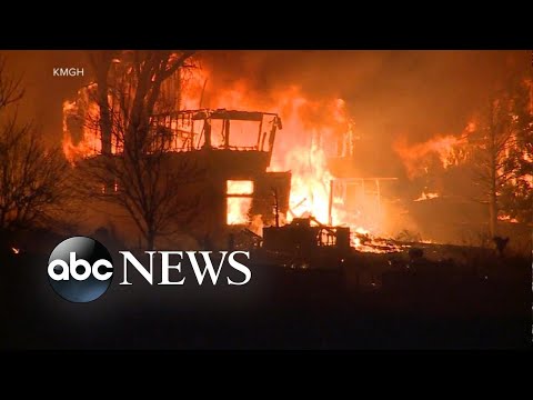 Life-threatening wildfires storm Colorado