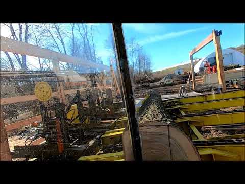 sawing the 23' red oak beam