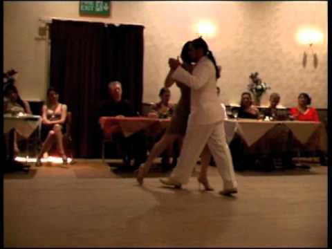  Adrian Costa  and  Amanda Costa  are  dancing  to  the  tango  "  Viviane De Paris  "