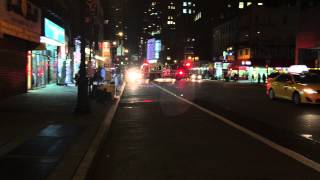 QUICK GLIMPSE OF FDNY ENGINE 26 RESPONDING ON W. 38TH ST. IN MIDTOWN, MANHATTAN,  NYC.