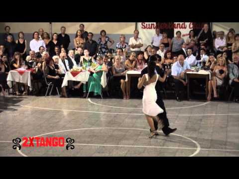  Maria Florencia Labiano  and  Hernán Rodriguez Chaile  are  dancing  to  the  milonga  "  Se Dice Se Mi  "