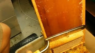 How to UNCAP a full honey frame fast with a hot knife - Beekeeping 101