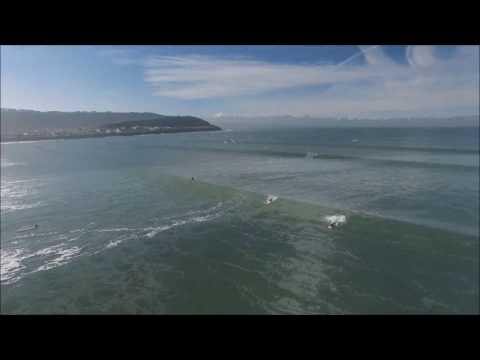 Drone footage of waves and surfers at Westward Ho