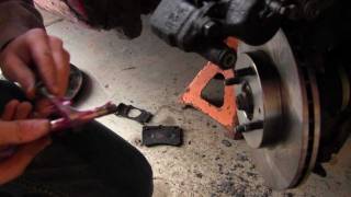 Front Disc Brake Job and How to Get a Stuck Tire Off Ford Escort Zx2