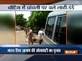Public scuffle with police during a society election in Kanpur