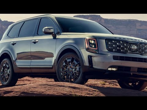 Part of a video titled HOW TO CHANGE A KIA TELLURIDE FLAT TIRE - YouTube