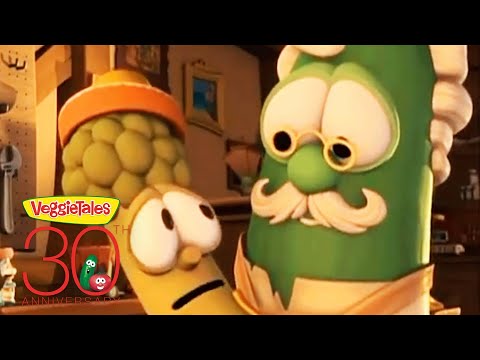 Close-up of VeggieTales characters—a green vegetable with glasses and a mustache beside a yellow, worried-looking veggie—with a VeggieTales 30th Anniversary logo in the foreground.