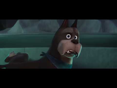 Trailer frame with Justice League heroes captured while Krypto looks determined