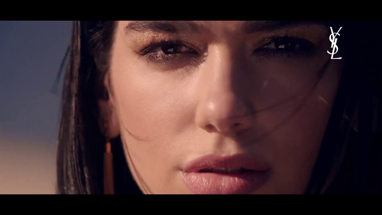 Close-up of Dua Lipa in the Yves Saint Laurent Libre fragrance campaign