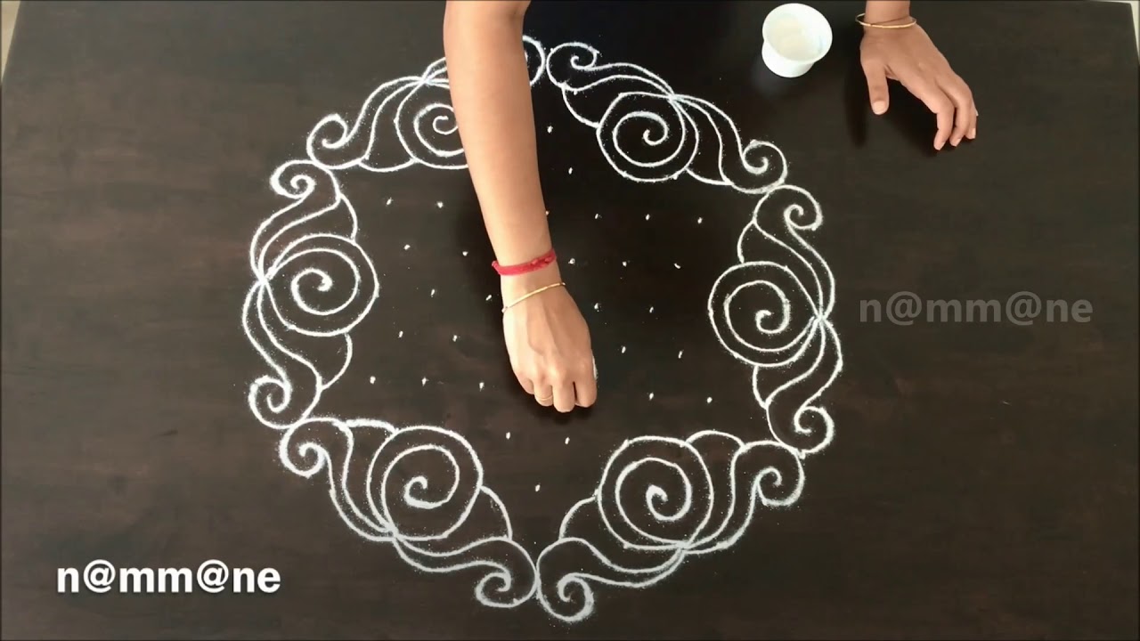 Beautiful rangoli design with dots by nammane