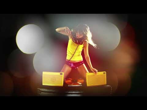 Cool blond woman dances with a retro Yellow record player on a leather couch - Disco House Music