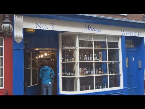 Visiting whisky store Milroy's of Soho in London, UK