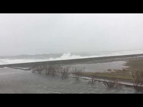 Waves crash onto Oceanside Drive