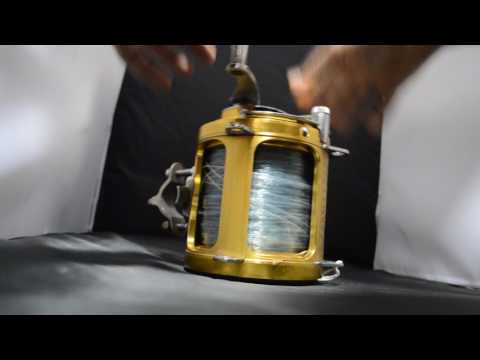 GREAT CONDITION PENN INTERNATIONAL 80TW W/ ROD BRACKETS NO RESERVE