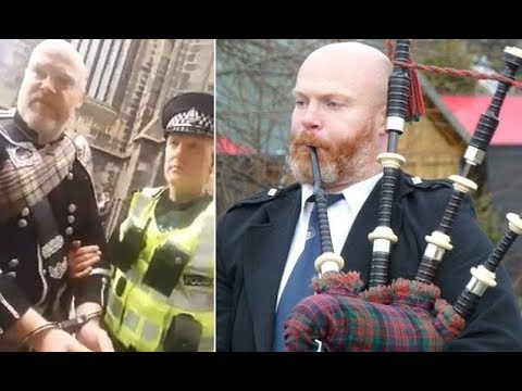 ‘Noisy’ bagpiper put in handcuffs by p oliceman in front of shocked tourists in Edinburgh