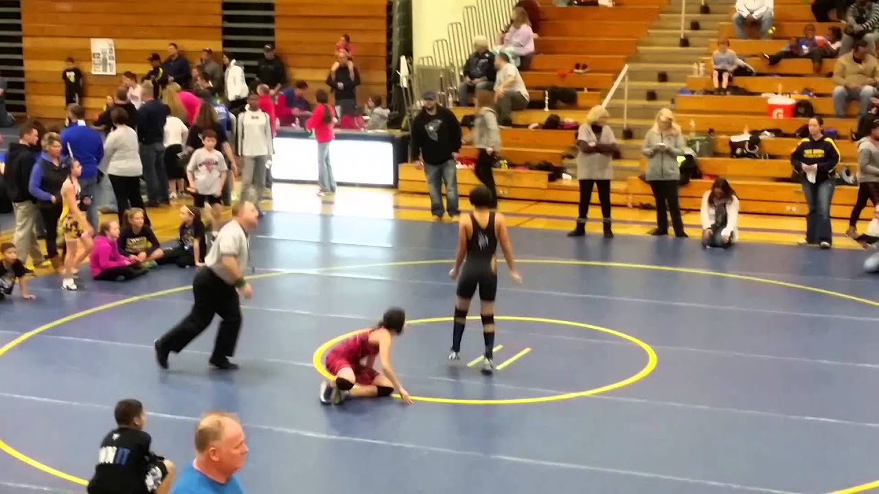 My boy x pin this girl at tournament.