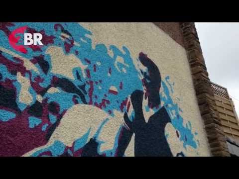 Claret legend Jimmy Mcllroy immotalised in paint