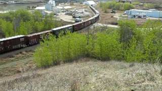 preview picture of video 'CN Freight Train leaves town of Peace River for Pulp Mill'