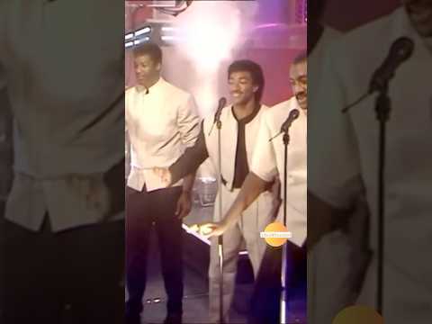 The Mac Band & McCampbell Brothers performs "Roses Are Red" 1988