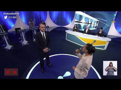 In a debate on RedeTV!, Marina Silva confronts Jair Bolsonaro about women's rights.