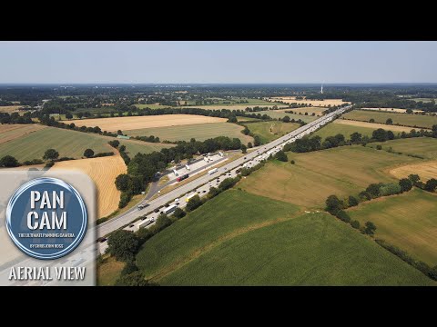 Siek, Kreis Stormarn, Schleswig-Holstein, Germany - Autobahn (A1) - 4K Ultra HD - Aerial Camera Pan