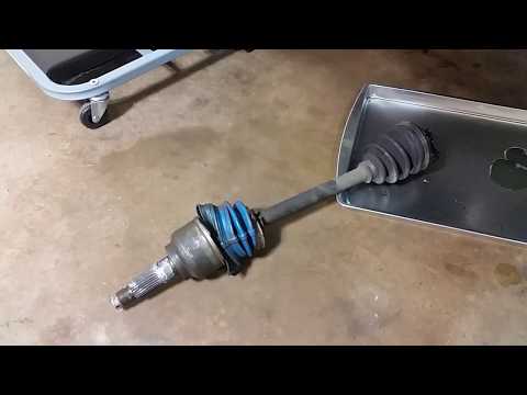 remove stuck cv axle on mazda Protege LX