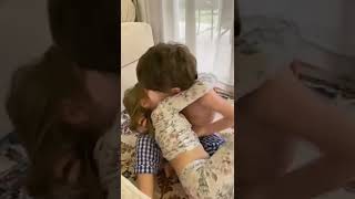 Brother consoles sister after crying from a boo-bo