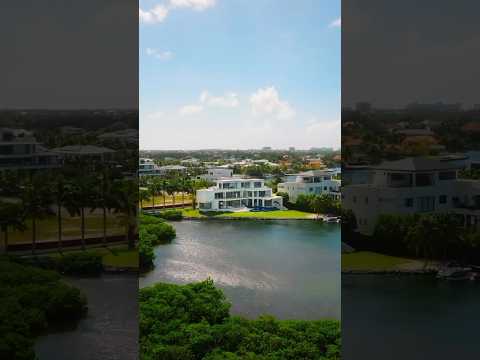 Perched on the pristine shores of Lalique Peninsula Quay, welcome to this $15M modern masterpiece.🌴 - The Agency