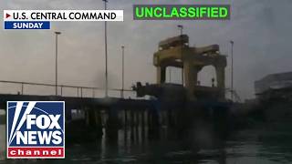 Fire burning on Kish Island in the Strait of Hormuz following US air strikes