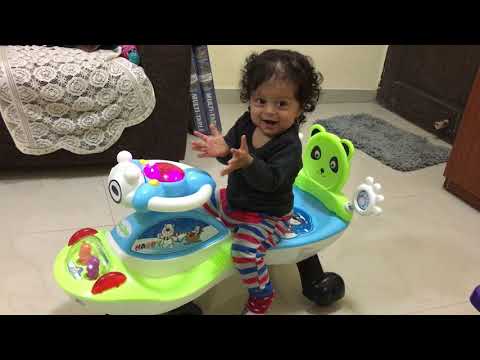 Praneel at 12 months - dancing to tune