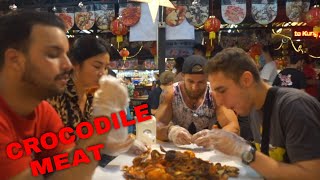 Black Man Eats crocodile Meat For the first time is it tasty