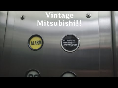 Vintage 1970's? Mitsubishi Traction Elevators at Centro Comercial Praia Grande - Macau