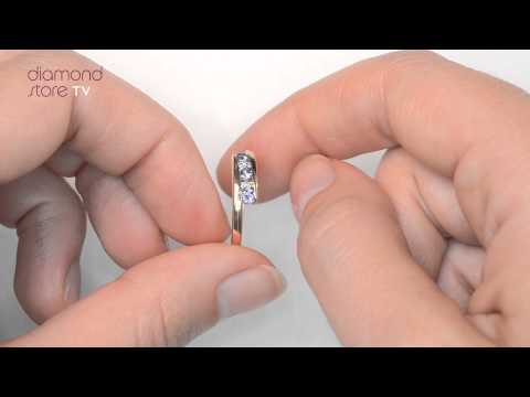 E5395 - Tanzanite 0.20CT And Diamond 9K Gold Ring